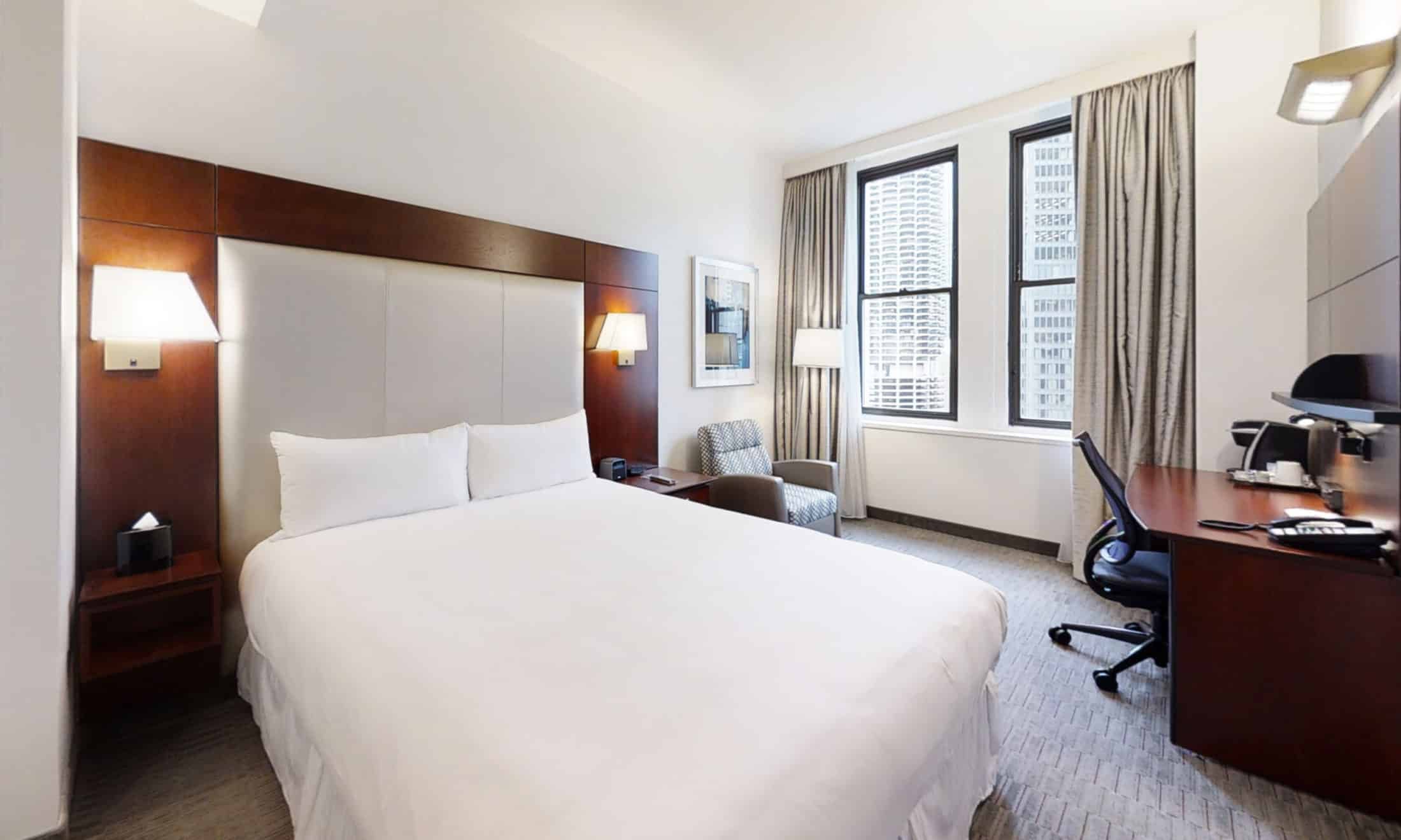 Standard-Queen-Room-with-a-River-View-240-SQFT-Bedroom